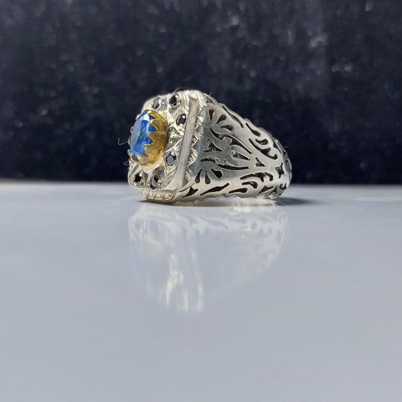 انگشتر نقره بانگین توپاز دور نگین یاقوت کبود کار دست ساز کد 1221